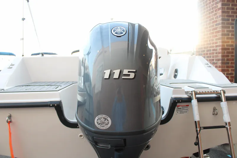 Slide: The Image of 2024 Starcraft 171 SVX boat with Yamaha 115 outboard motor, rear view. - 3