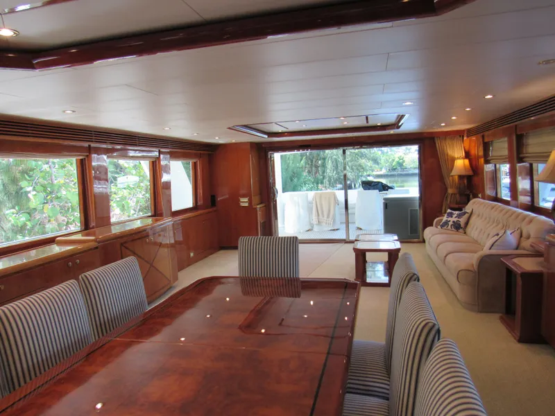 Slide: The Image of Luxurious interior of a 2002 Hargrave Raised Pilothouse yacht with elegant wood finishes. - 18
