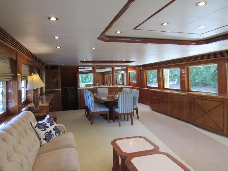 Slide: The Image of Luxurious interior of 2002 Hargrave Raised Pilothouse yacht with elegant dining area and plush seating. - 20