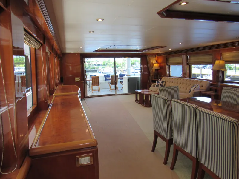 Slide: The Image of Luxurious interior of 2002 Hargrave Raised Pilothouse yacht with elegant dining and seating area. - 22