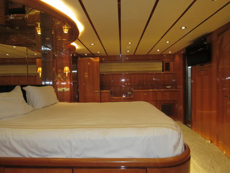 Slide: The Image of Luxurious kitchen in 2002 Hargrave Raised Pilothouse yacht with granite countertops and stainless steel appliances. - 33