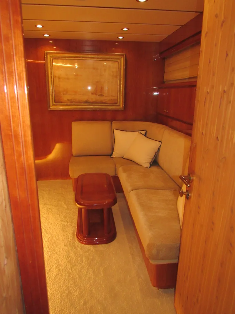 Slide: The Image of Luxurious bedroom interior of 2002 Hargrave Raised Pilothouse yacht with wood paneling. - 36