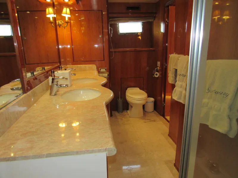 Slide: The Image of Luxurious 2002 Hargrave Raised Pilothouse interior with cozy seating and elegant wood paneling. - 39