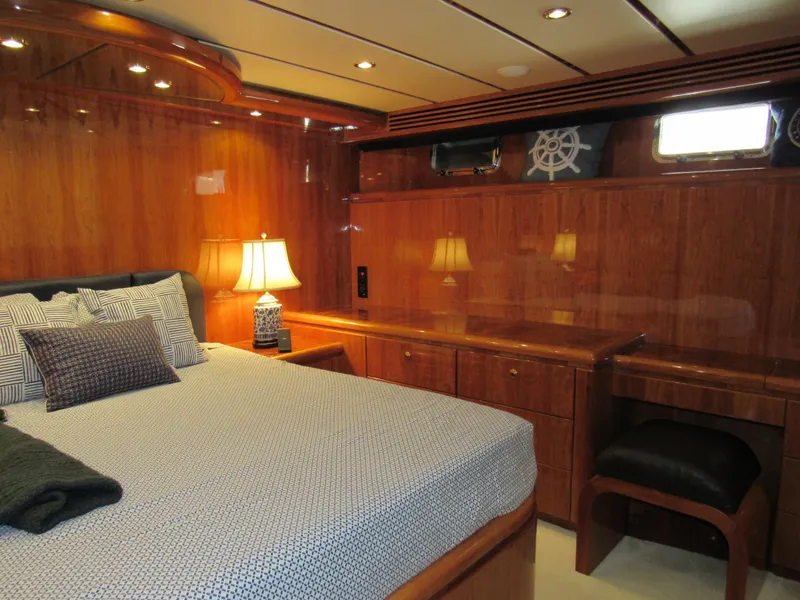 Slide: The Image of Luxurious 2002 Hargrave Raised Pilothouse yacht interior with elegant wood finishes and cozy lighting. - 41