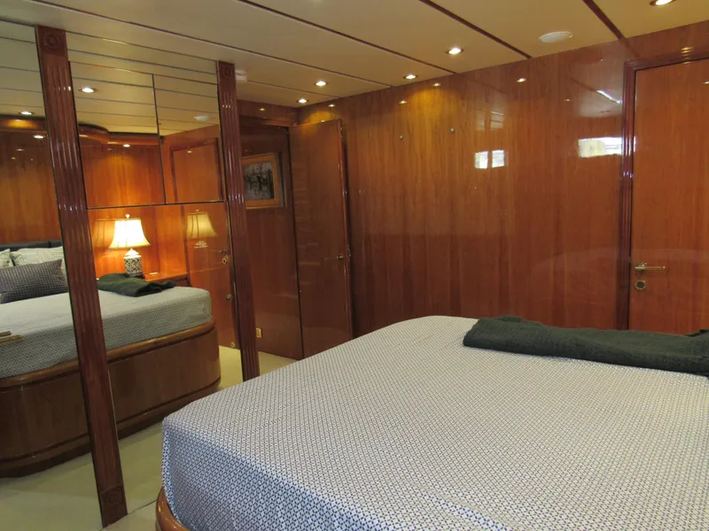 Slide: The Image of Luxurious bathroom in 2002 Hargrave Raised Pilothouse yacht with dual sinks and elegant wood finishes. - 42