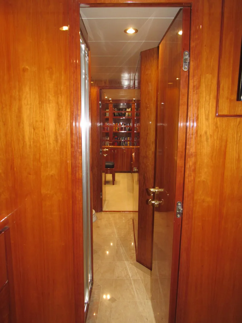 Slide: The Image of Luxurious bathroom in 2002 Hargrave Raised Pilothouse yacht with dual sinks and elegant wood cabinetry. - 47