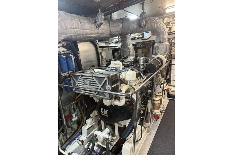 Slide: The Image of Engine room of 2002 Hargrave Raised Pilothouse yacht with CAT marine engine. - 60