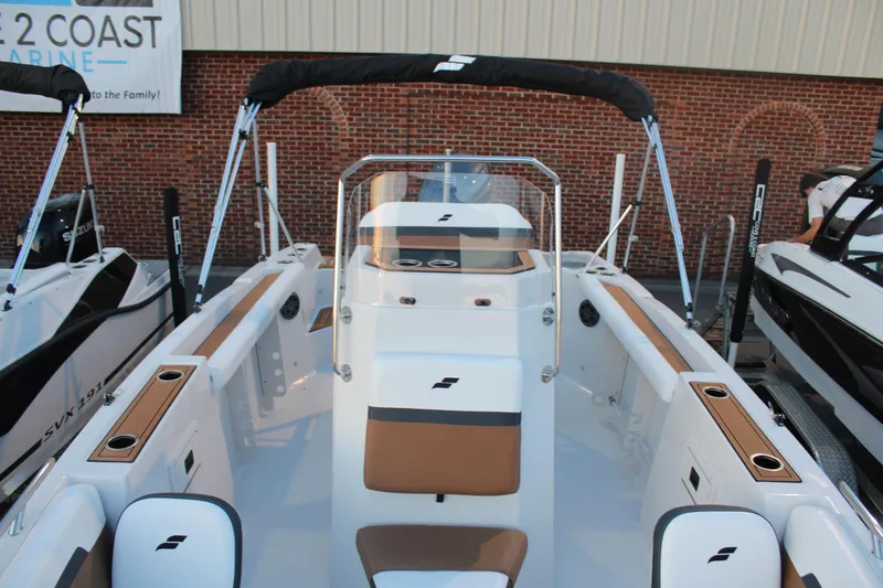 Slide: The Image of 2024 Starcraft SVX 211 OB CC boat with sleek design and modern features. - 8