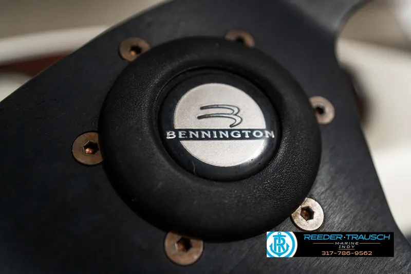 Slide: The Image of Close-up of Bennington 2050 RL steering wheel emblem, 2003 model. - 32