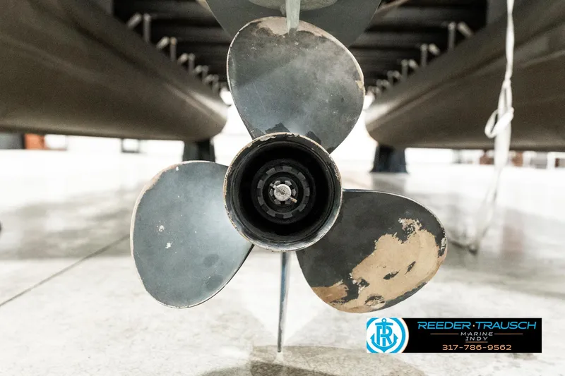 Slide: The Image of Propeller of 2003 Bennington 2050 RL pontoon boat, close-up view. - 44