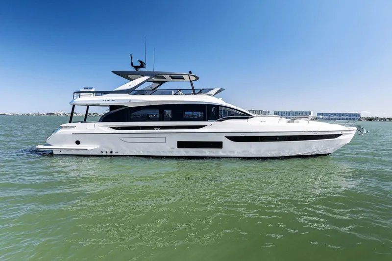 Slide: The Image of Cockpit of 2026 Azimut Fly 72 yacht with modern controls and ocean view. - 8