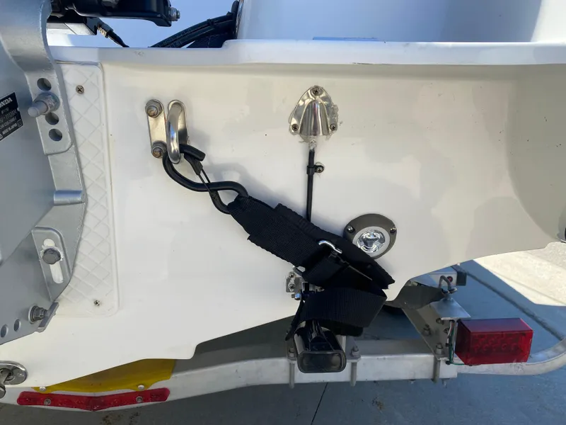 Slide: The Image of 2021 Walker Bay Generation 525 DLX boat transom with trailer attachment. - 15