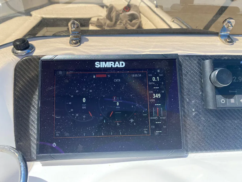 Slide: The Image of Simrad display on 2021 Walker Bay Generation 525 DLX boat dashboard. - 34