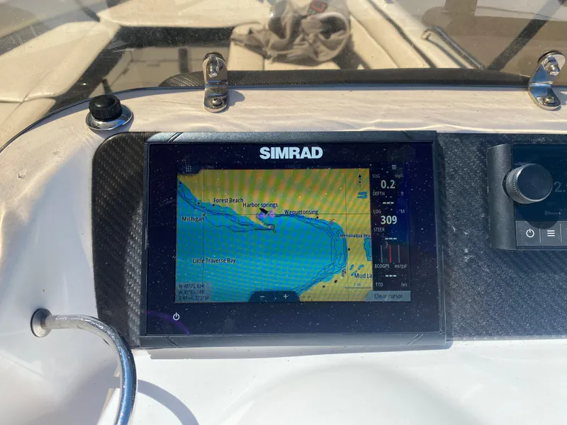 Slide: The Image of Simrad navigation system on 2021 Walker Bay Generation 525 DLX boat dashboard. - 35