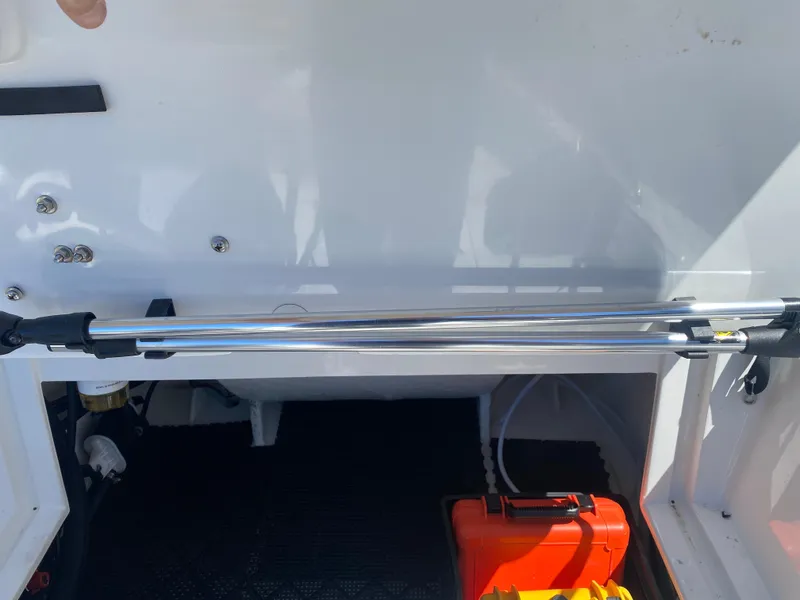 Slide: The Image of 2021 Walker Bay Generation 525 DLX interior with storage compartment and safety equipment. - 41