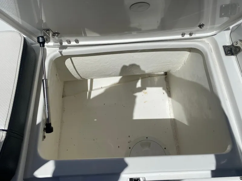 Slide: The Image of Open storage compartment in 2021 Walker Bay Generation 525 DLX boat. - 45