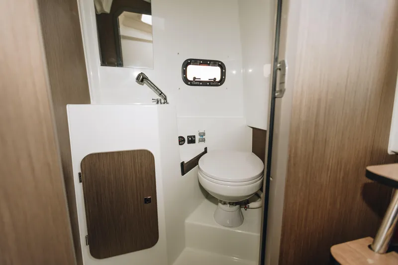 Slide: The Image of 2023 Beneteau Flyer 9 SPACEdeck bathroom with compact design and modern fixtures. - 9