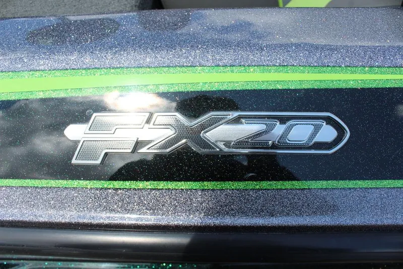 Slide: The Image of 2017 Skeeter FX20 LE boat logo with metallic finish and green accents. - 14