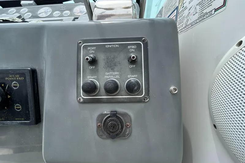 Slide: The Image of Control panel of a 1999 Tiara Yachts 400 Express boat. - 36
