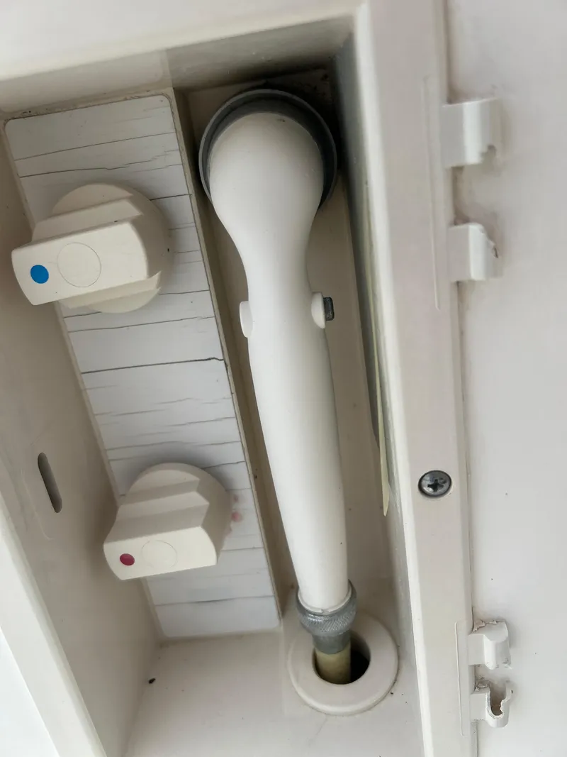 Slide: The Image of Built-in shower controls on a 1999 Tiara Yachts 400 Express. - 38