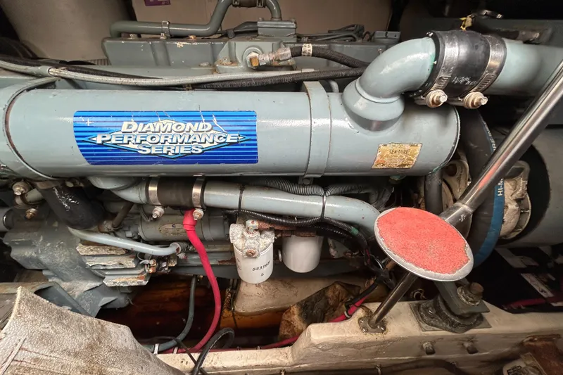 Slide: The Image of Engine of a 1999 Tiara Yachts 400 Express, featuring Diamond Performance Series components. - 44