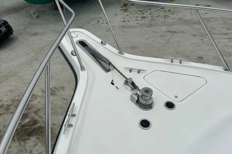 Slide: The Image of 1999 Tiara Yachts 400 Express bow with anchor and railing. - 46