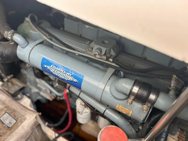 Slide: The Image of Engine component of a 1999 Tiara Yachts 400 Express, featuring a Diamond Performance part. - 6