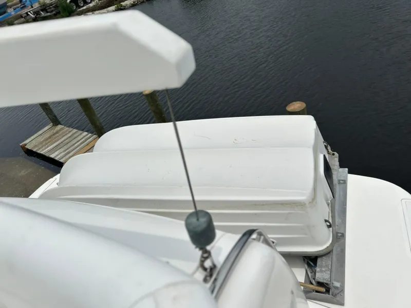 Slide: The Image of 1999 Tiara Yachts 400 Express, view of deck and water, dockside. - 7