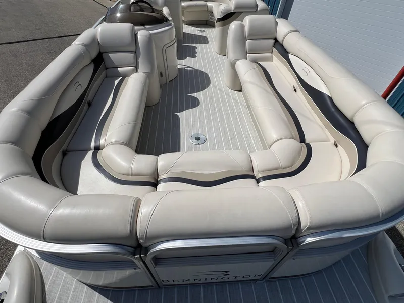Slide: The Image of 2004 Bennington 2575 RLX pontoon boat with spacious seating and sleek design. - 1