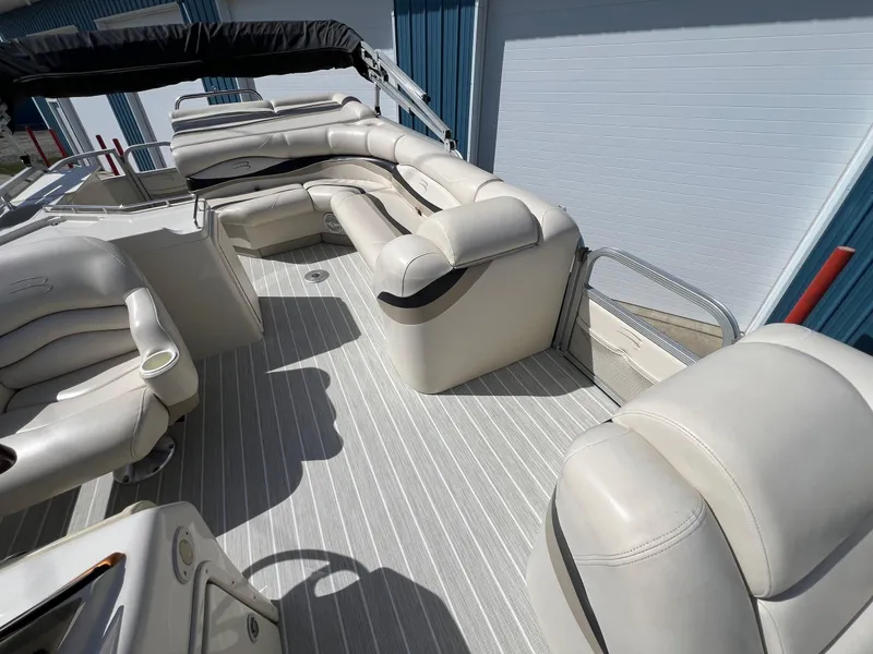 Slide: The Image of 2004 Bennington 2575 RLX pontoon boat with spacious seating and sleek design. - 25