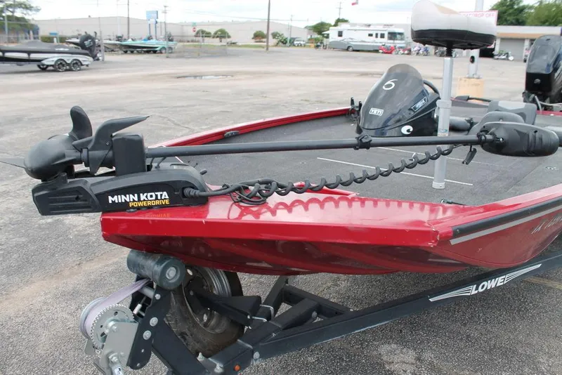 Slide: The Image of 2018 Lowe Stinger 175C boat with Minn Kota PowerDrive trolling motor. - 6