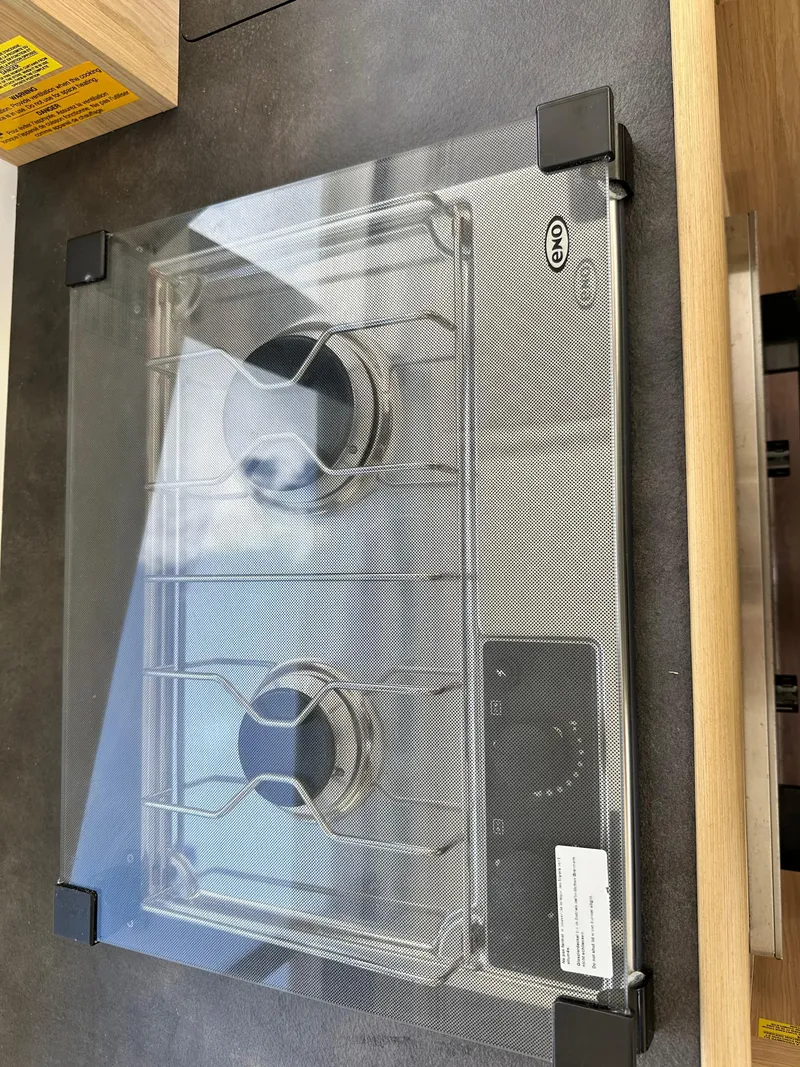 Slide: The Image of Glass-covered stove on a Beneteau Swift Trawler 35, 2022 model. - 49