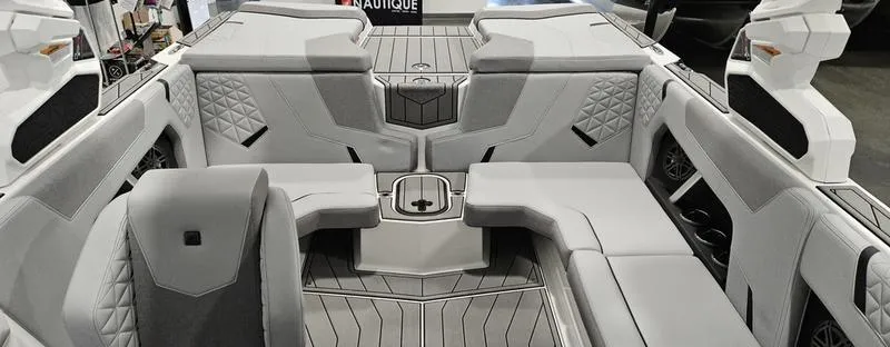Slide: The Image of 2025 Nautique Super Air Nautique GS20 interior with luxurious seating and modern design. - 14