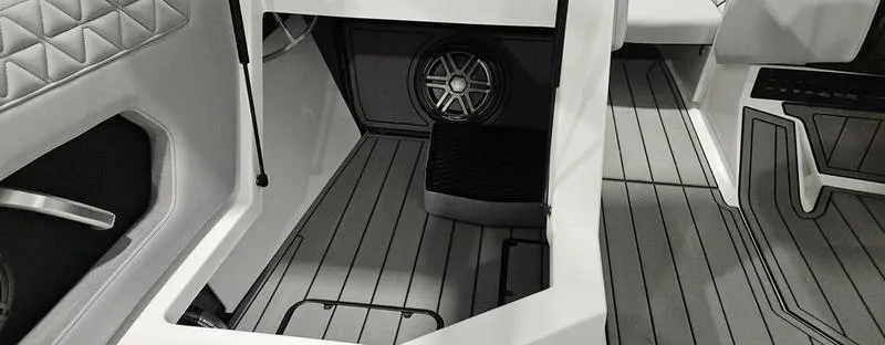 Slide: The Image of 2025 Nautique Super Air Nautique GS20 interior with sleek seating and modern speaker system. - 15