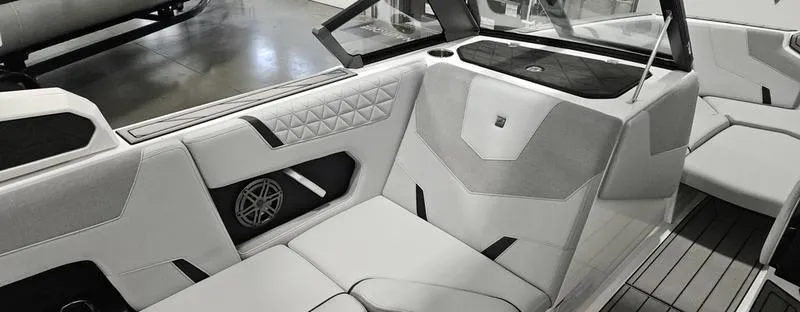 Slide: The Image of 2025 Nautique Super Air Nautique GS20 interior with modern seating and sleek design. - 9