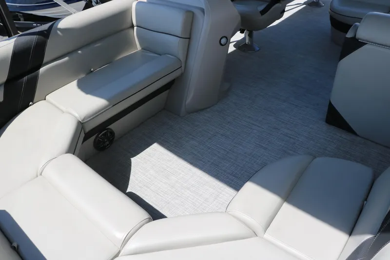 Slide: The Image of Interior of 2021 Trifecta 24 RFC pontoon boat with spacious seating and modern design. - 16