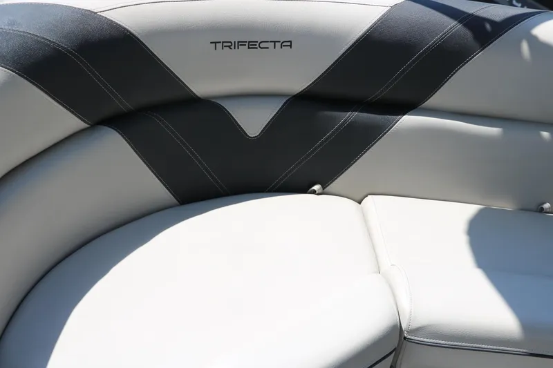 Slide: The Image of 2021 Trifecta 24 RFC boat seating with elegant gray and white upholstery. - 18