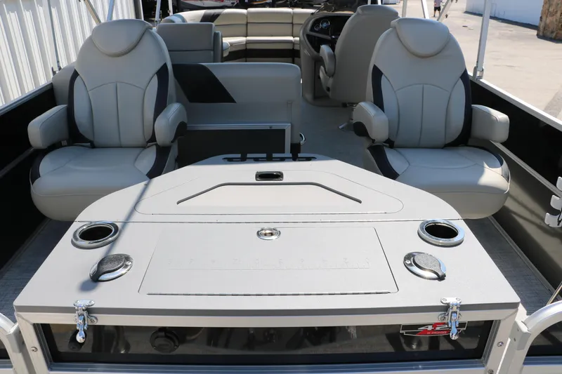 Slide: The Image of 2021 Trifecta 24 RFC boat interior with plush seating and modern amenities. - 19
