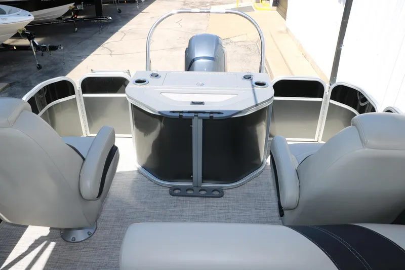 Slide: The Image of 2021 Trifecta 24 RFC pontoon boat interior with seating and helm. - 25