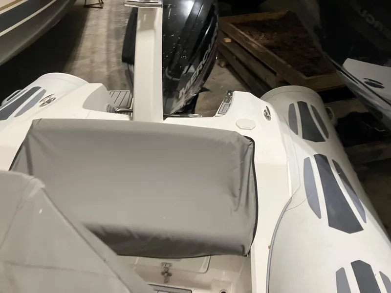 Slide: The Image of 2015 Brig Eagle 480 inflatable boat with outboard motor in storage. - 13