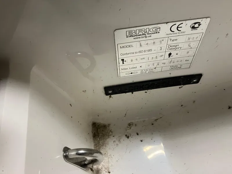 Slide: The Image of 2015 Brig Eagle 480 boat interior with model plate and anchor point. - 16