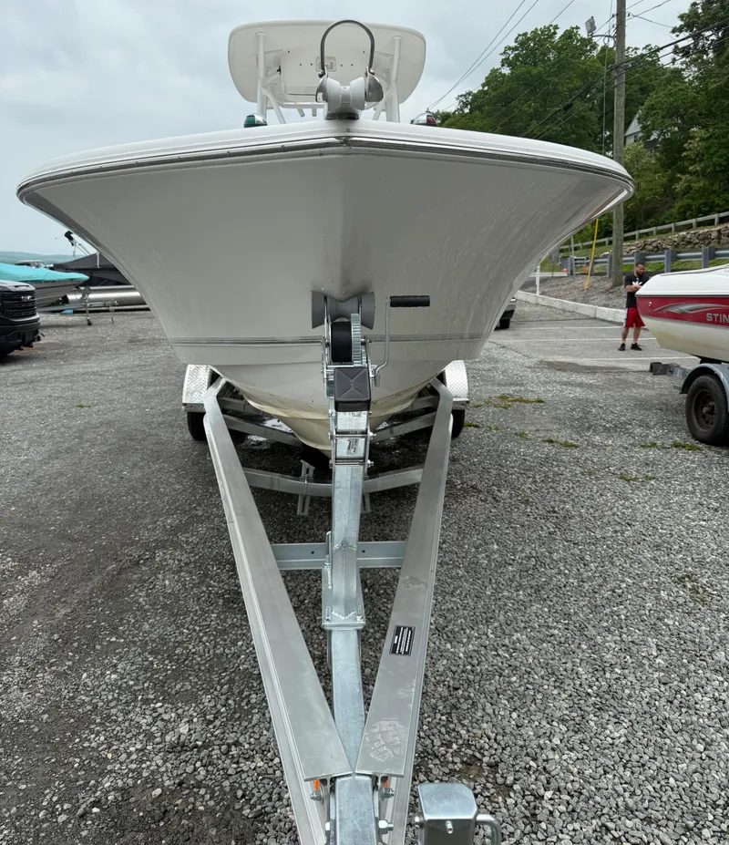 Slide: The Image of 2011 Tidewater 250CC Adventure Twin Engine boat on trailer, front view. - 12