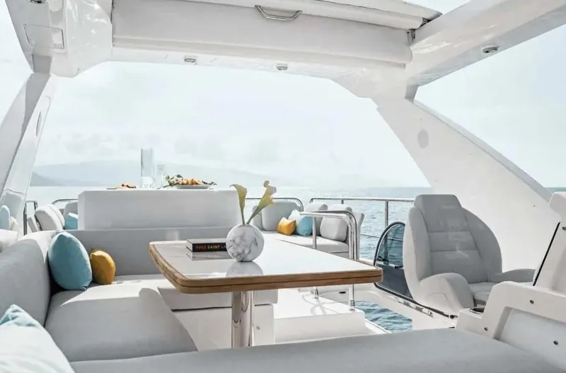 Slide: The Image of Luxurious interior of 2024 Azimut 50 Fly yacht with elegant seating and ocean view. - 3