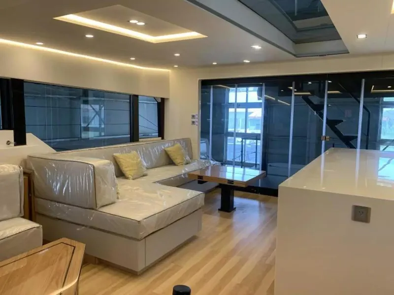 Slide: The Image of Luxurious interior of 2026 McConaghy MC55 yacht with modern seating and sleek design. - 16