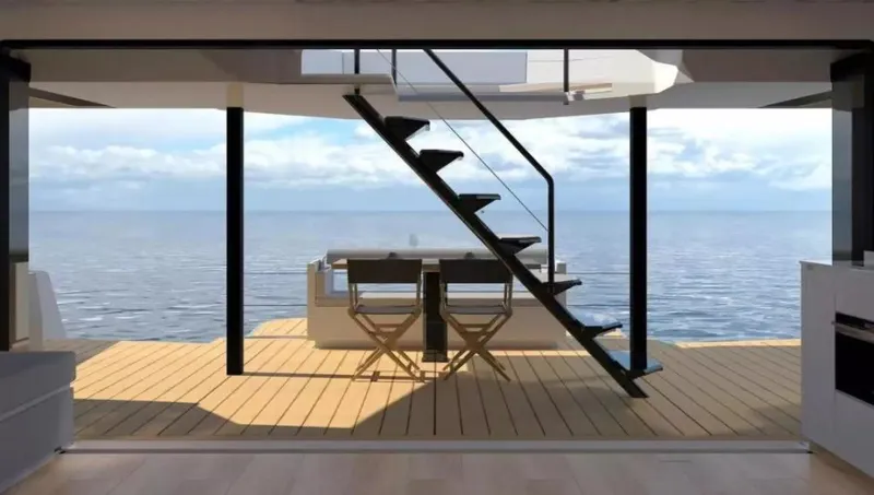 Slide: The Image of Modern McConaghy MC55 yacht interior with ocean view, featuring sleek staircase and outdoor seating, 2026 model. - 9