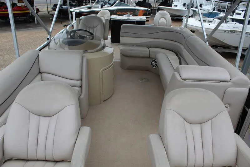 Slide: The Image of 2010 Bennington 2275 Fish pontoon boat with spacious seating and modern design. - 12