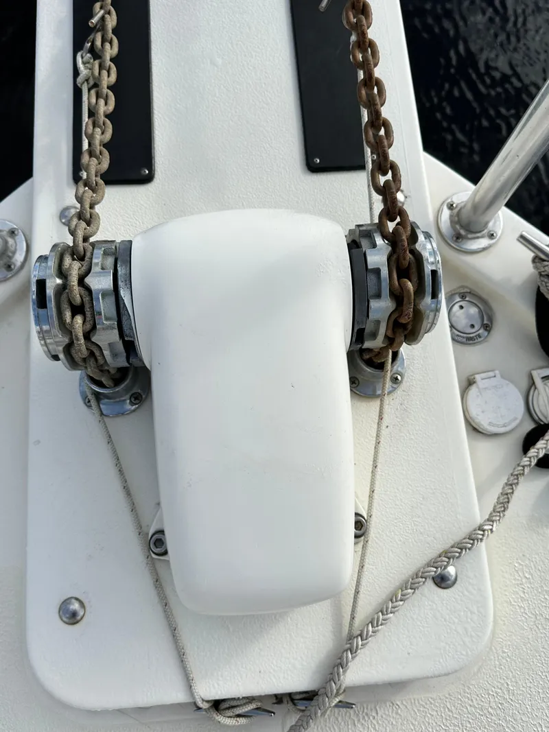 Slide: The Image of Anchor windlass on 2005 Great Harbour N37 boat deck with chains and ropes. - 22