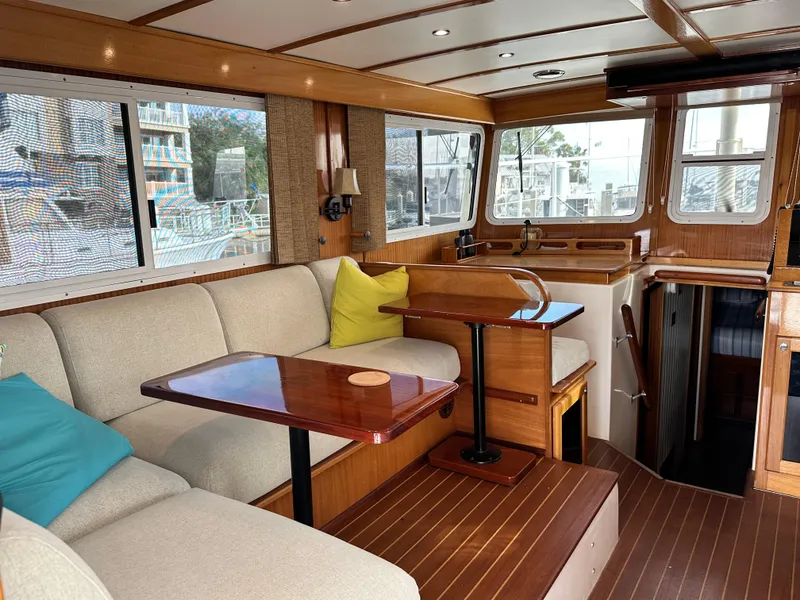 Slide: The Image of Interior of 2005 Great Harbour N37 yacht with cozy seating and wooden finishes. - 36