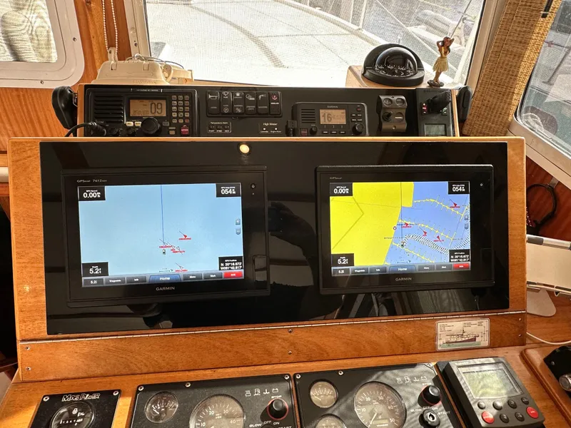 Slide: The Image of Pilothouse of 2005 Great Harbour N37 with dual Garmin navigation displays. - 42