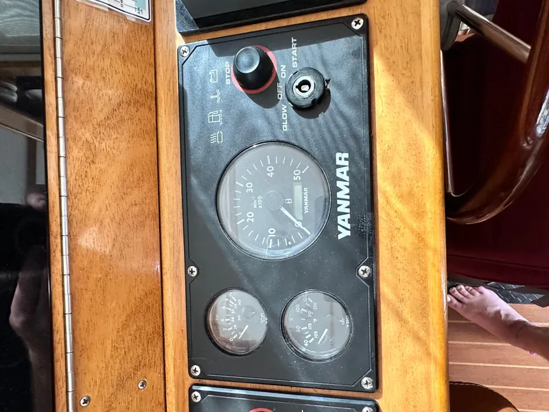 Slide: The Image of Control panel of a 2005 Great Harbour N37 boat with Yanmar gauges. - 48